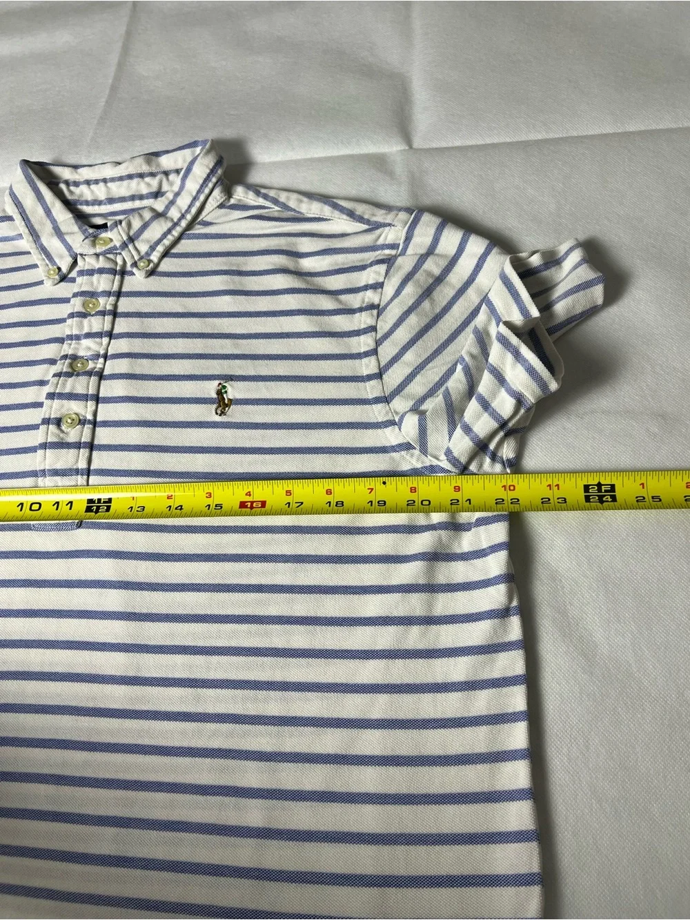 Ralph Lauren blue and white striped polo shirt
